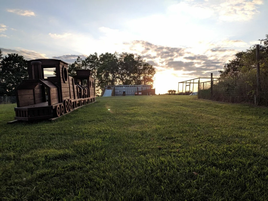 sunsetting with wooden train
